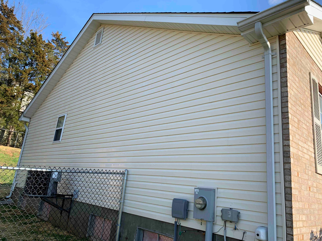 pressure washed vinyl siding in arnold, mo
